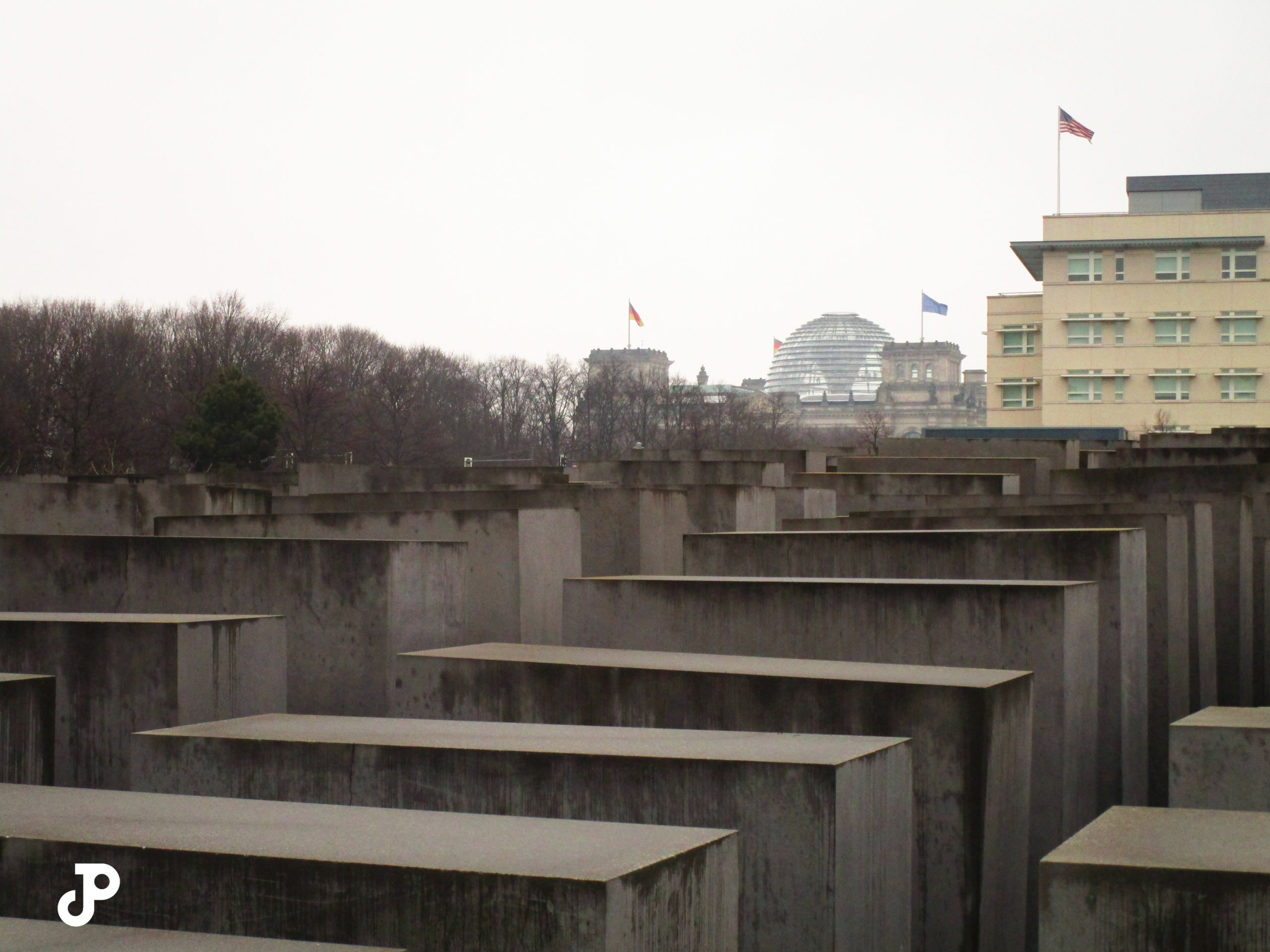 the Memorial for the Murdered Jews of Europe, with the dome of the Reichstag visible in the distance