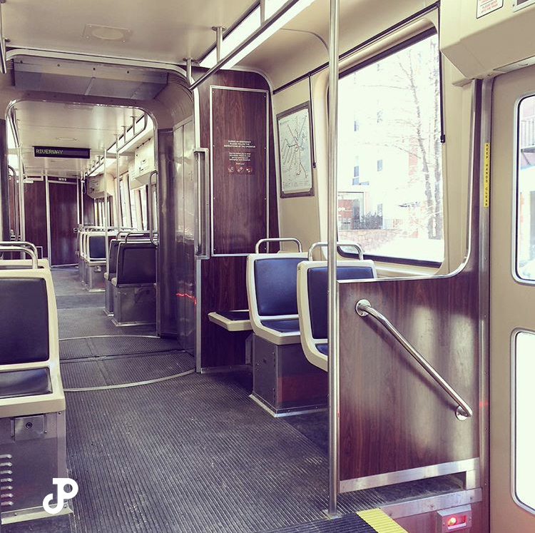 the interior of a subway car on the Green Line