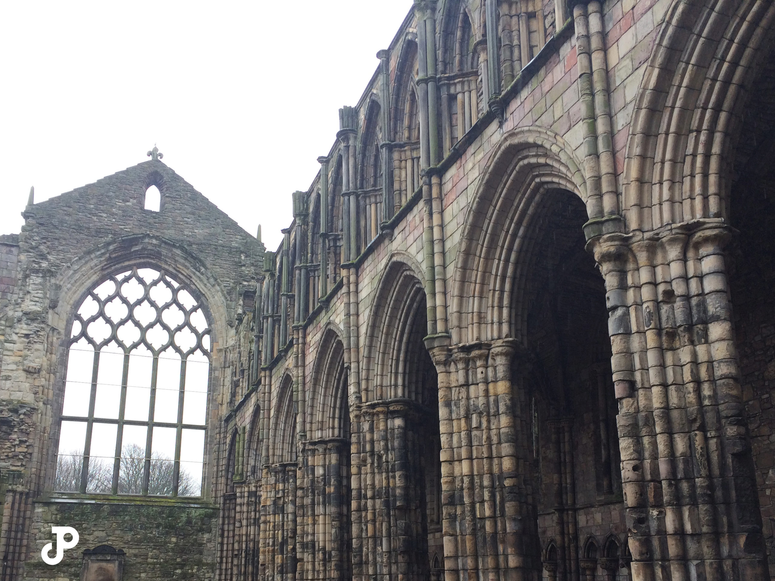 the ruins of Holyrood Abbey, comprising towering gothic arches