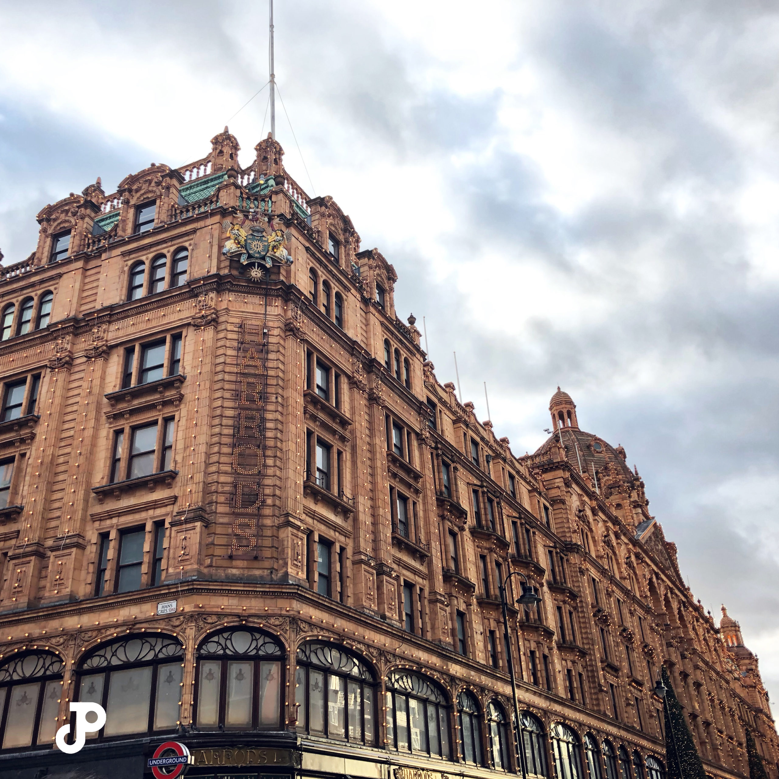 an outside view of Harrods, London