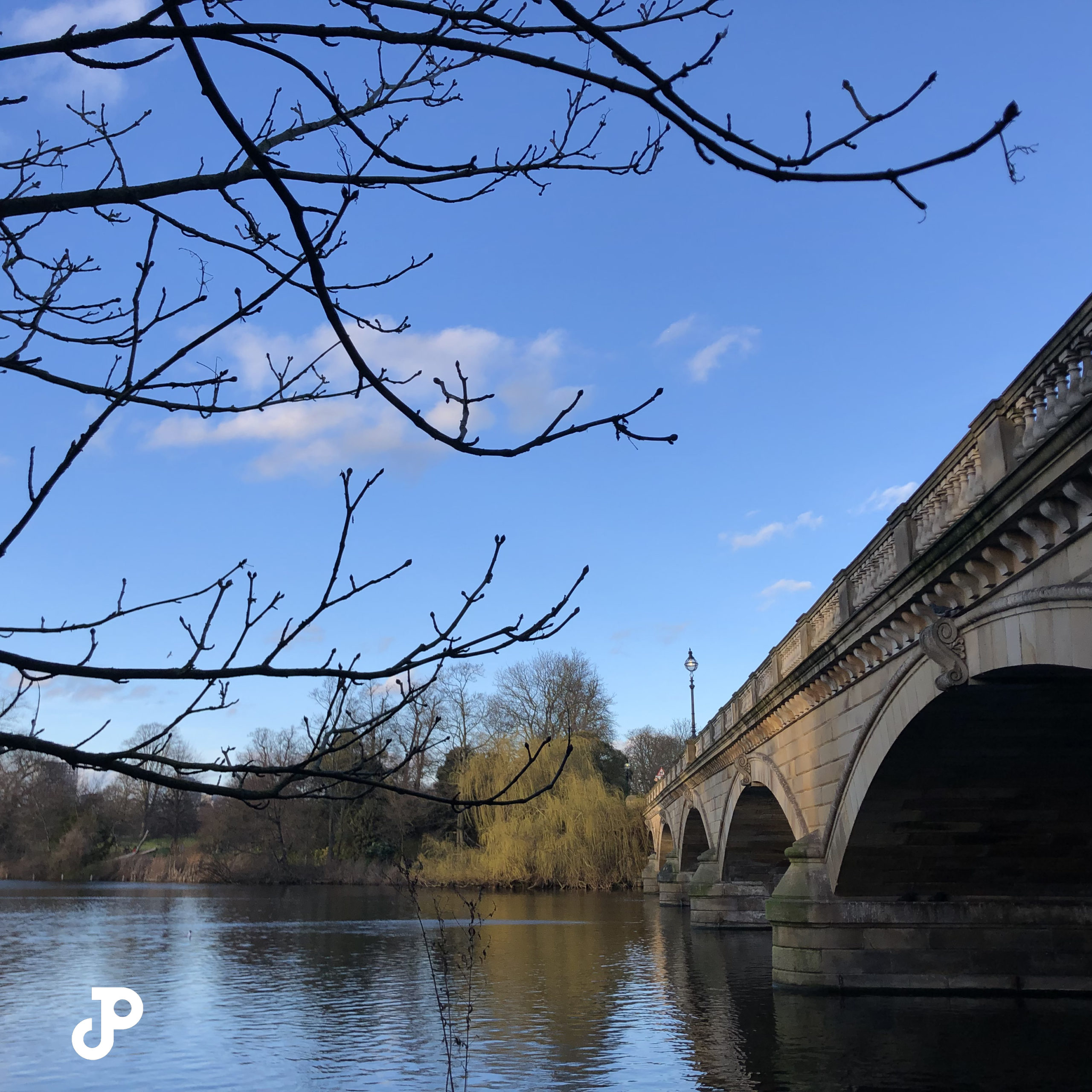 a bridge spanning the Serpentine river in Hyde Park